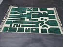 moroccan mrirt rug, green wool rug, abstract moroccan rug, handmade moroccan rug, ivory and green rug, luxury wool rug, berber style rug, modern moroccan rug, geometric wool rug, high pile moroccan rug, artisanal wool rug, hand knotted rug, deep green rug