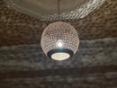 Unique ceiling fixture featuring a handcrafted brass design, perfect for enhancing home decor.