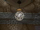 Handmade Moroccan round brass pendant with scallop-cut filigree design. Perfect boho light fixture for dreamy shadows and elegant any decor