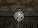 Handmade Moroccan round brass pendant with scallop-cut filigree design. Perfect boho light fixture for dreamy shadows and elegant any decor